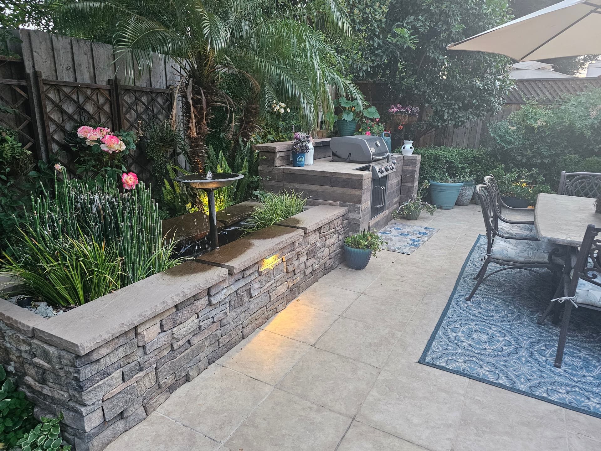 Backyard Outdoor Living Space With Patio and Outdoor Kitchen in Fresno image