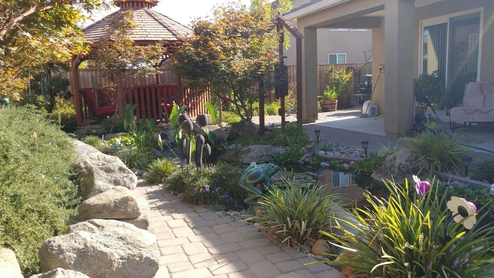 Gallery photos for Natural Koi Pond and Gazebo with Waterfall: Image #9